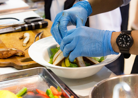 Chef cooking food in the kitchen, Chef preparing foodの写真素材