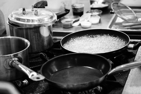 Steel pots, Stainless steel kitchenware Black & White, stove cooking, Utensils for cookingの写真素材