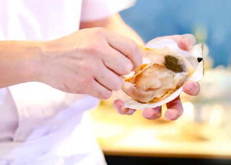 Fresh oyster on hand chef, Clean and Open Raw Oysters