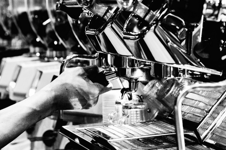 Espresso shot from coffee machine in coffee shop,Coffee maker in coffee shopの写真素材