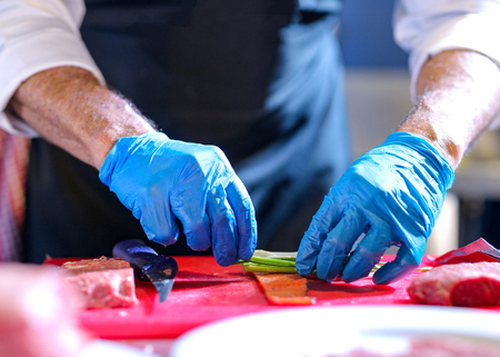 Chef preparing food, meal, in the kitchen, chef cooking, Chef decorating dish, closeupの写真素材