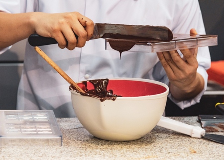 Chocolate fudge frosting, making chocolate fudgeの写真素材