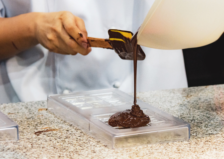Chocolate fudge frosting, making chocolate fudgeの写真素材