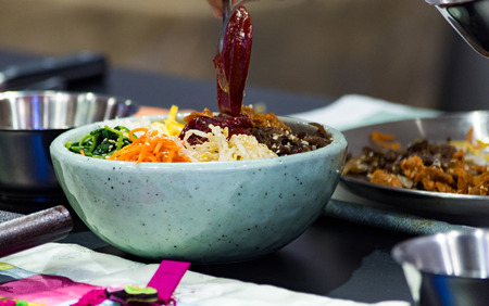 Bibimbap, Traditional Korean cuisine bibimbap, Chef preparing Korean food, chef cooking in kitchenの写真素材