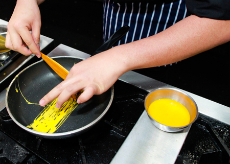 Chef preparing food, meal, in the kitchen, chef cooking, Chef decorating dish, closeupの写真素材