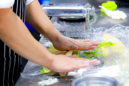 Chef Making Fresh Homemade Pasta, cooking Italian pasta, or noodlesの写真素材