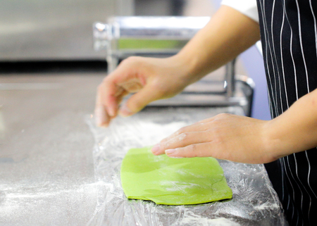 Chef Making Fresh Homemade Pasta, cooking Italian pasta, or noodlesの写真素材