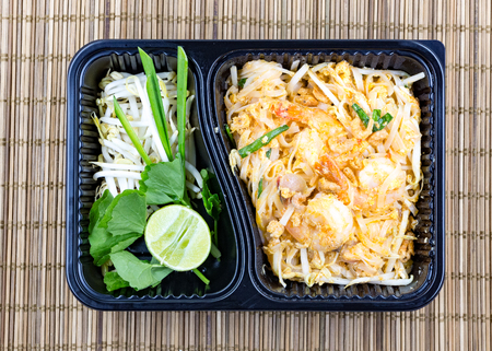 Pad thai noodles Take away food in plastic black box , Thai food styleの写真素材