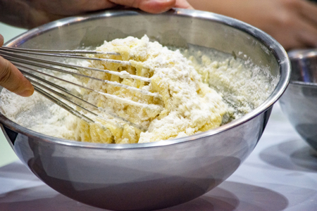 chef making dough on kitchen, Mixing Butter Milk Pastry Bakery, cook and cakeの写真素材