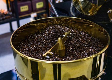 Roasted coffee in coffee roaster, arabica roasted coffee cropの写真素材
