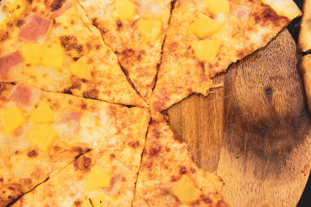 chef prepares delicious pizza on the kitchenの写真素材