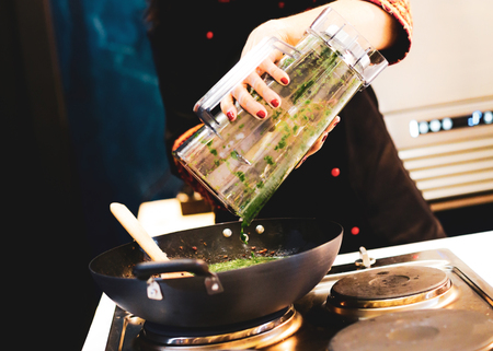 Chef preparing food, meal, in the kitchen, chef cooking, Chef decorating dish, closeupの写真素材