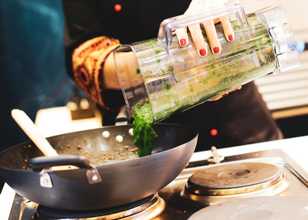 Chef preparing food, meal, in the kitchen, chef cooking, Chef decorating dish, closeup