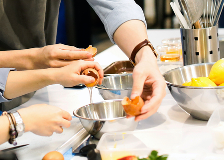 Chef preparing food, meal, in the kitchen, chef cooking, Chef decorating dish, closeupの写真素材