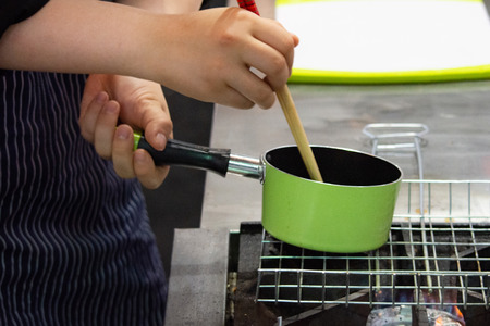 Chef preparing food, meal, in the kitchen, chef cooking, Chef decorating dish, closeupの写真素材