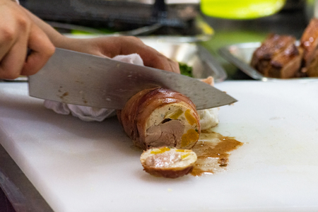 Chef preparing food, meal, in the kitchen, chef cooking, Chef decorating dish, closeupの写真素材