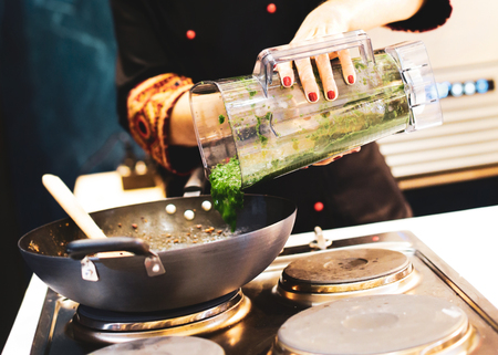 Chef preparing food, meal, in the kitchen, chef cooking, Chef decorating dish, closeupの写真素材