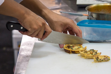 Chef preparing food, meal, in the kitchen, chef cooking, Chef decorating dish, closeupの写真素材