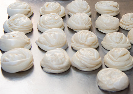 Making of Roti Canai, cooking process, Indian traditional street foodの写真素材