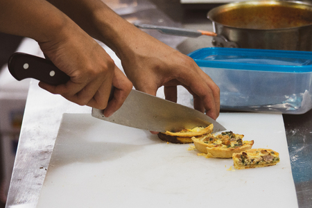Chef preparing food, meal, in the kitchen, chef cooking, Chef decorating dish, closeupの写真素材