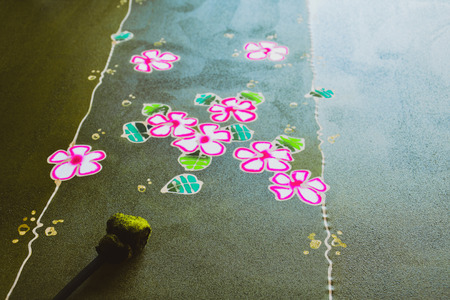 Painting watercolor on the fabric to make Batik, Making Batik, painting traditional batikの写真素材