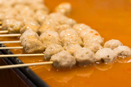 Grilled pork meatballs with sweet chili sauce at street food, Meatballs with deliciousの写真素材