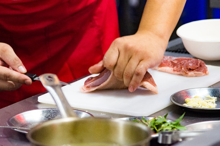 Chef preparing food, meal, in the kitchen, chef cooking, Chef decorating dish, closeupの写真素材