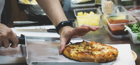 Chef preparing pizza , The process of making pizzaの写真素材