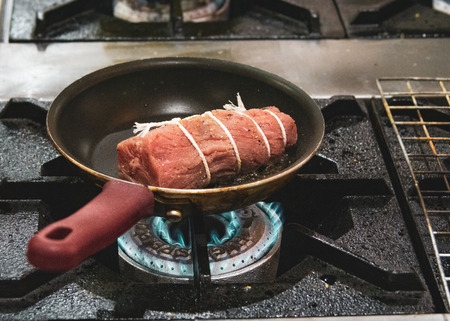 Chef preparing food, meal, in the kitchen, chef cooking, Chef decorating dish, closeupの写真素材