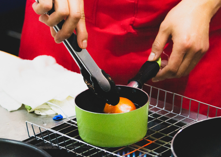 Chef preparing food, meal, in the kitchen, chef cooking, Chef decorating dish, closeupの写真素材