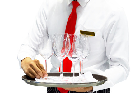Waiter holding tray with glasses of wine on white background, Waitress servingの写真素材