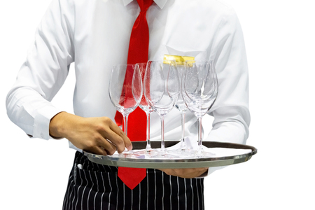 Waiter holding tray with glasses of wine on white background, Waitress servingの写真素材