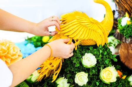 Thai fruit carving with hand, Vegetable and Fruit Carvingの写真素材