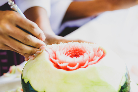 Thai fruit carving with hand, Vegetable and Fruit Carvingの写真素材