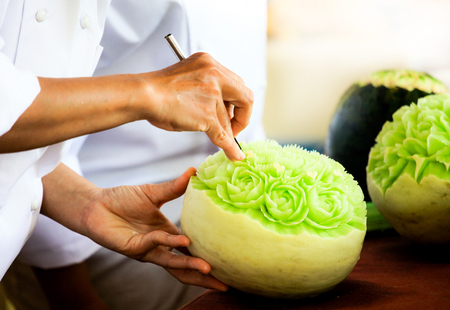 Thai fruit carving with hand, Vegetable and Fruit Carvingの写真素材