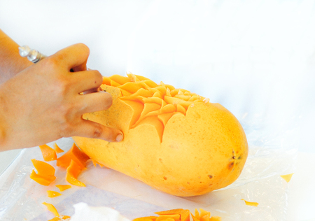 Thai fruit carving with hand, Vegetable and Fruit Carvingの写真素材
