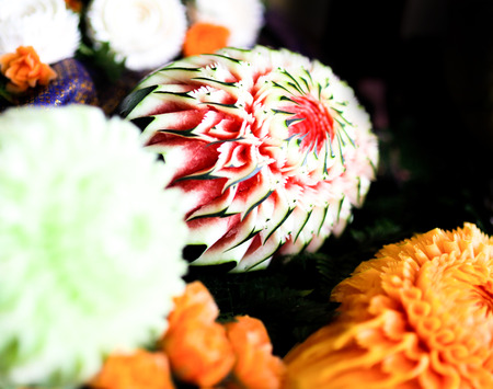 Thai fruit carving with hand, Vegetable and Fruit Carving