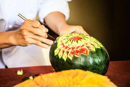 Thai fruit carving with hand, Vegetable and Fruit Carvingの写真素材