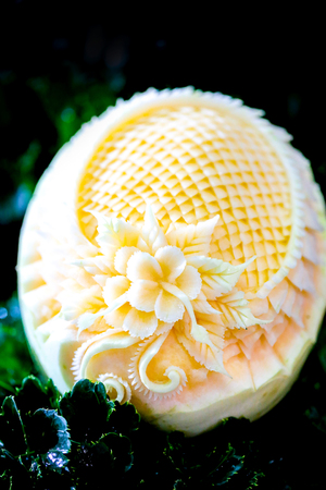Thai fruit carving with hand, Vegetable and Fruit Carvingの写真素材