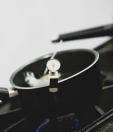 Food thermometer, Dial Thermometer in Heating Waterの写真素材