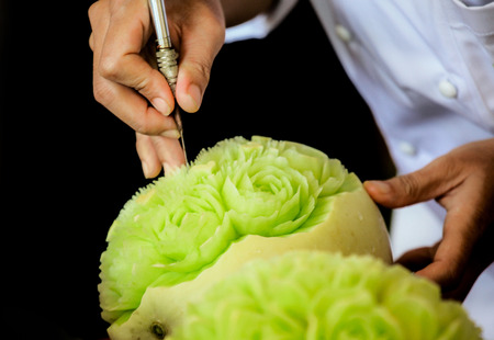 Thai fruit carving with hand, Vegetable and Fruit Carvingの写真素材