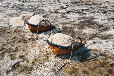 Salt evaporation pond, salt in the salt sea salt farm, Thailandの写真素材