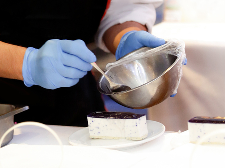 Chef preparing food, meal, in the kitchen, chef cooking, Chef decorating dish, closeupの写真素材