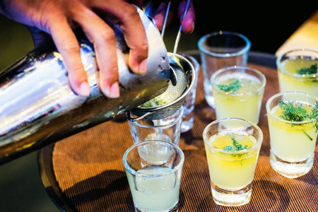 Bartender making alcohol cocktail at bar counter, Cocktail vodka or gin