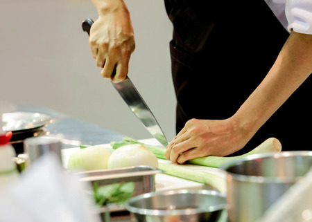 Chef preparing food, meal, in the kitchen, chef cooking, Chef decorating dish, closeup