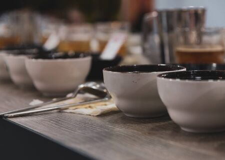 Tasting coffee in glass, Coffee cups on table for tastingの写真素材
