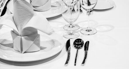 Table setting  Dinner plate in restaurant, black and white photo