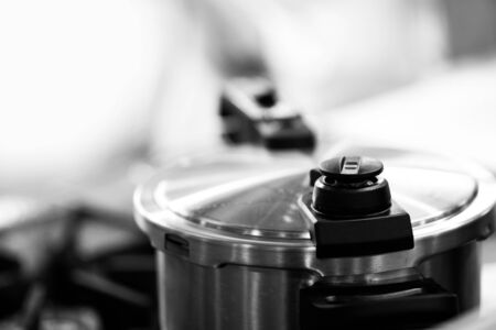 Pressure cooker steam over cooking in a Kitchen の写真素材
