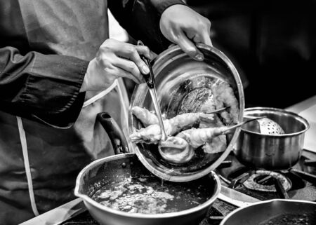 Chef cooking in a kitchen, chef at work, Black & White