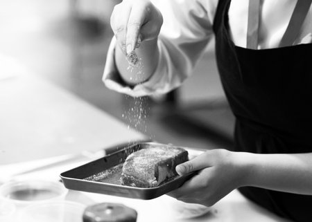 Chef cooking in a kitchen, chef at work, Black and White